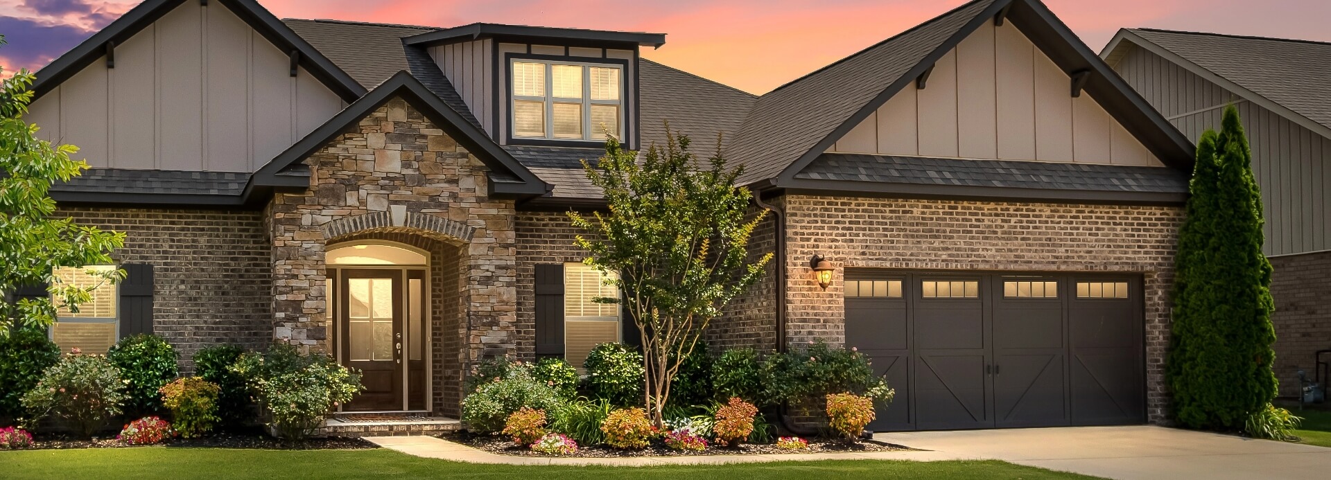Wide front view of house with wooden roof image